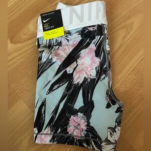 Nike Women’s Small Multi color + flower shorts